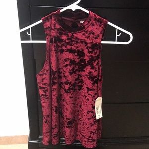 Velvet top. Never used with tags